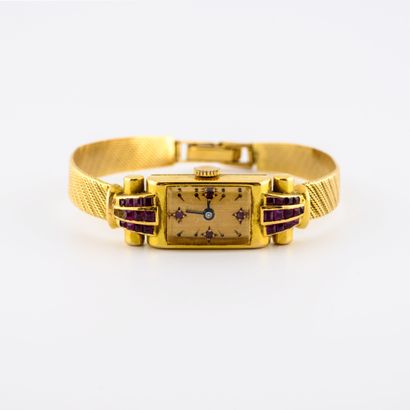 Yellow gold (750) lady's wristwatch 

Rectangular...