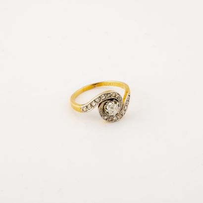 Yellow and white gold (750) ring centered...