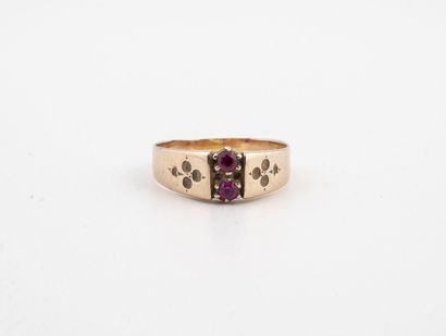 
Yellow gold (750) ring centered with two...