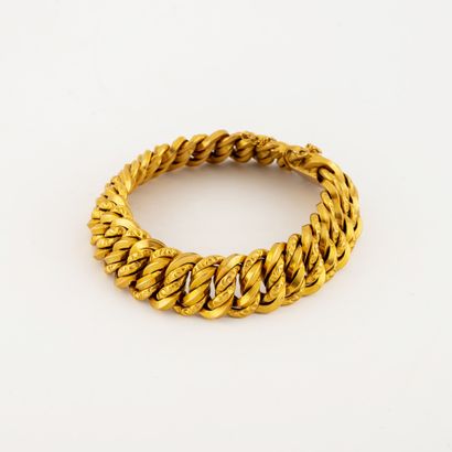 Bracelet en or jaune (750) à maille tressée,...