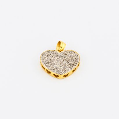 
Yellow gold (750) heart pendant with a pavement...