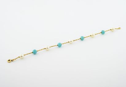 
Yellow gold bracelet (750) formed of a fine...