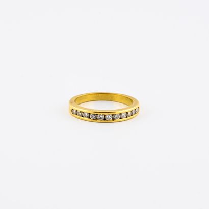 null 
Half wedding ring in yellow gold (750) set with brilliant-cut diamonds in a...
