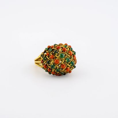 
Dome ring set with cabochons of emeralds...