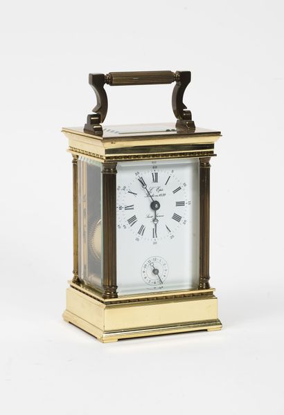L'ÉPÉE, Sainte Suzanne, La Marquise Glass and gilt brass travel clock of terminal...