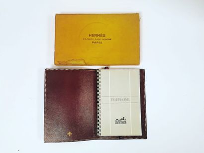 HERMES Paris Red leather phone book.

With bookmark. 

Signed inside. 

With box...