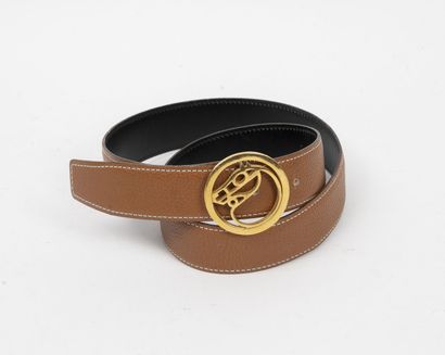 HERMES Paris Ceinture réversible en veau grainé gold surpiqûres sellier et box noir.

La...