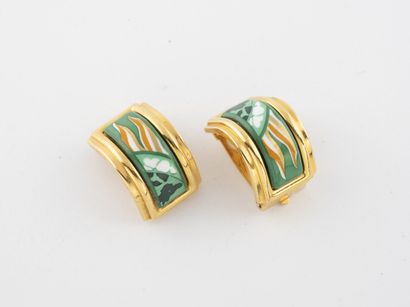 HERMES Paris Pair of gilded metal clips of half-cylindrical form with enamelled decoration...