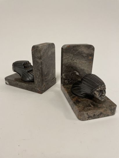 null Pair of bookends.

In grey marble with white veins, decorated with a stylized...