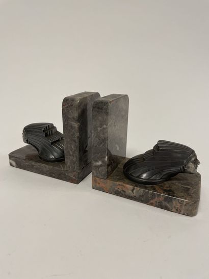 null Pair of bookends.

In grey marble with white veins, decorated with a stylized...