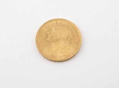 SUISSE A 20 francs gold coin, Helvetia, 1935.

Weight : 6.44 g.

Wear.