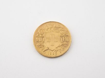 SUISSE A 20 francs gold coin, Helvetia, 1935.

Weight : 6.44 g.

Wear.