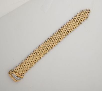 null Bracelet ceinture en or jaune (750) à motifs losangiques articulés. Fermoir...