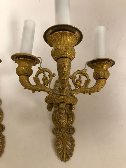 null Pair of ormolu sconces with a bouquet of three light arms in the form of horns,...