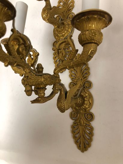  Pair of ormolu sconces with a bouquet of three light arms in the form of horns,...