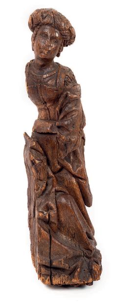 Sainte Femme au turban. En chêne sculpté,...