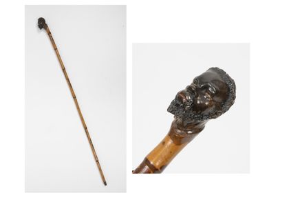 Canne tête de vieil homme Cane with a bearded man's head motif.

Bamboo shaft.

H....