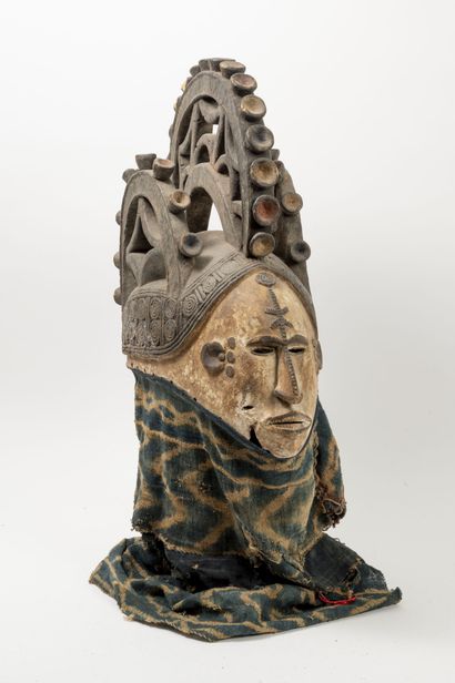 NIGERIA Igbo dance helmet mask.

Wood, crusty patina and polychrome decoration.

With...