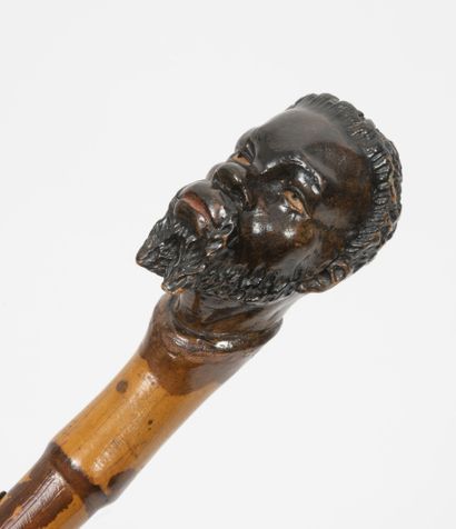 Canne tête de vieil homme Cane with a bearded man's head motif.

Bamboo shaft.

H....