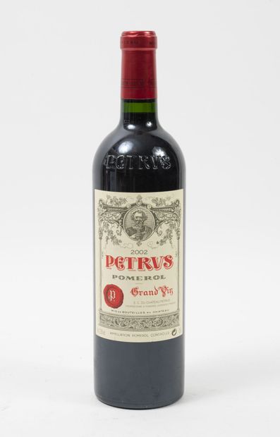 PETRUS 1 bouteille, 2002.

Pomerol.

Bon niveau.

Infimes griffures à l'étiquett...