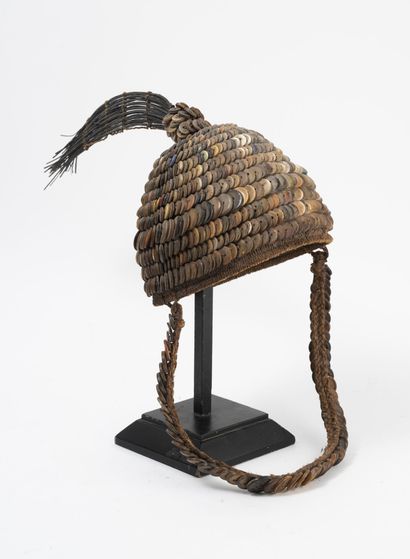 CONGO, LÉGA Bwame initiate's headdress, braided vegetable fiber and buttons.

Total...