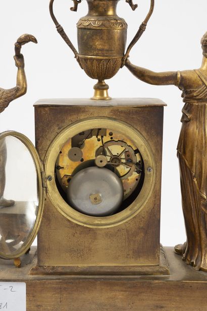FRANCE, premier tiers du XIXème siècle Gilt bronze and brass clock decorated with...