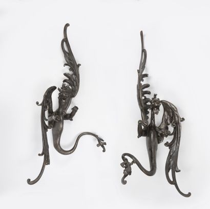 Pair of sconces in patinated metal decorated...