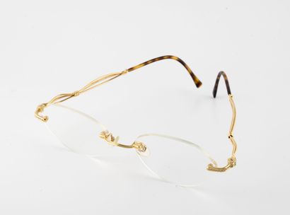 Henry JULLIEN Paire de lunettes à monture en métal plaqué or et ornée de petits diamants...