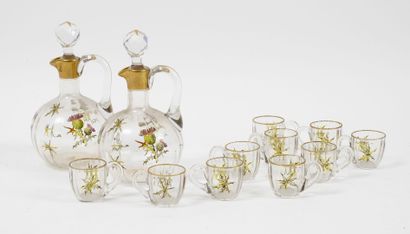 BACCARAT Service with liqueur.

In colorless crystal with polychrome enamelled and...