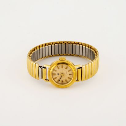 Montre bracelet de dame en or jaune (750).

Cadran...