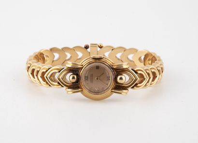 LONGINES Montre bracelet de dame en or jaune (750).

Boîtier rond à épais verre et...
