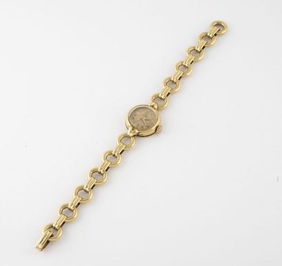 OMEGA Montre bracelet de dame en or jaune (750).

Boîtier rond.

Cadran à fond doré,...