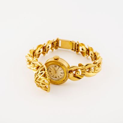 ZENITH Montre bracelet de dame en or jaune (750).

Boîtier rond. 

Cadran à fond...
