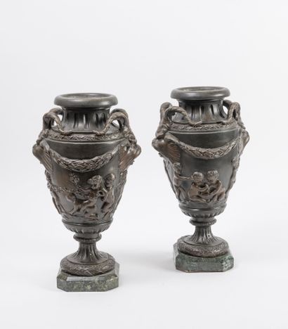 D'après CLODION, fin du XIXème ou début du XXème siècle Pair of tapered vases on...