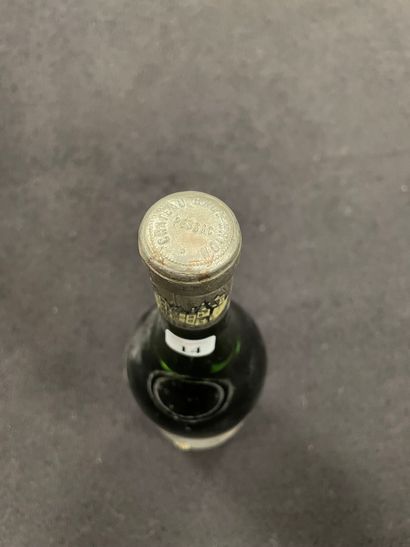 CHÂTEAU HAUT-BRION 1 bouteille, 1959.

1er GCCC Pessac Leognan.

Niveau bas.

Taches...