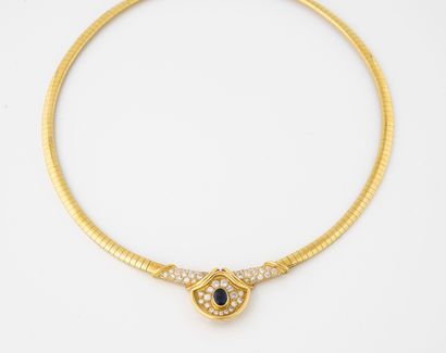 null Yellow gold (750) snake chain necklace, the neckline adorned with a large semi-circular...
