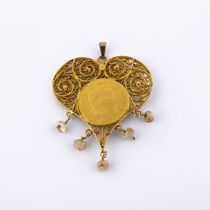 null Yellow gold (750) heart pendant centered with a 10 francs gold coin, Napoleon...