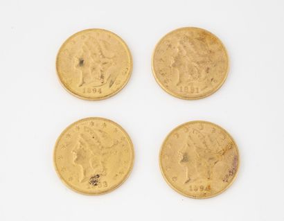 ETATS-UNIS Lot de quatre pièces de 20 dollars or, 1881, 1883 et (x2), 1894.

Poids...