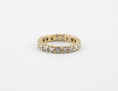 null American wedding band in yellow gold (750) set with brilliant-cut diamonds....