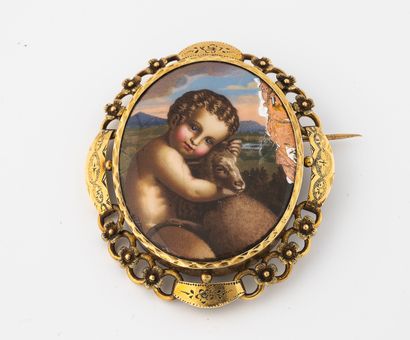 Oval medallion brooch centered with an enamel...