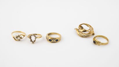 Lot of three rings in yellow gold (750) including...