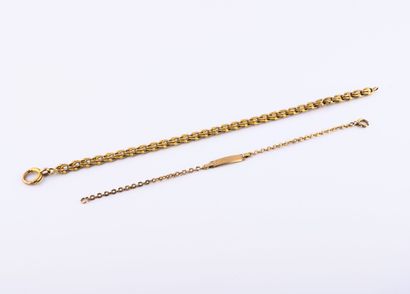 null Lot of jewelry in yellow gold (750) including a watch chain with twisted mesh...