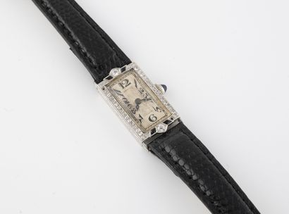 null Ladies' wristwatch in platinum (min. 850).

Rectangular case paved with eight-eighths-cut...