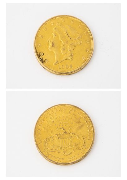 ETATS-UNIS Pièce de 20 dollars or, 1904.

Poids : 33.4 g. 

Légères rayures et u...