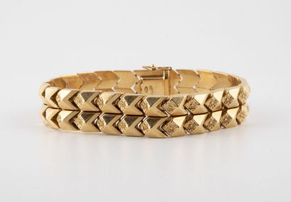 Bracelet articulé en or jaune (750) à maillons...