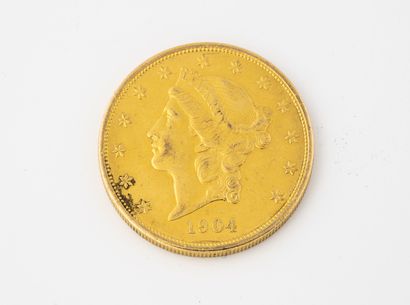 ETATS-UNIS 20 dollars gold coin, 1904.

Weight : 33.4 g. 

Slight scratches and ...