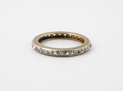 null American wedding band in rhodium-plated yellow gold (750) set with rose-cut...