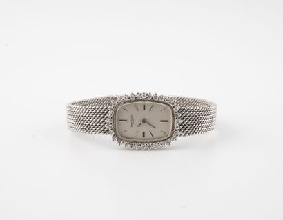 BERNEY-BLONDEAU, Genève Montre bracelet de dame en or gris (750).

Boîtier rectangulaire....