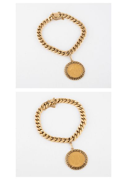 null Yellow gold (750) curb chain bracelet adorned with a pendant holding a gold...