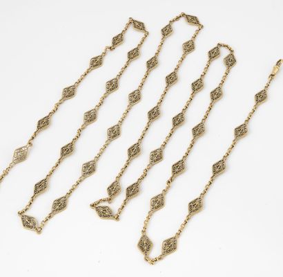 Long necklace with openwork filigree shuttle...